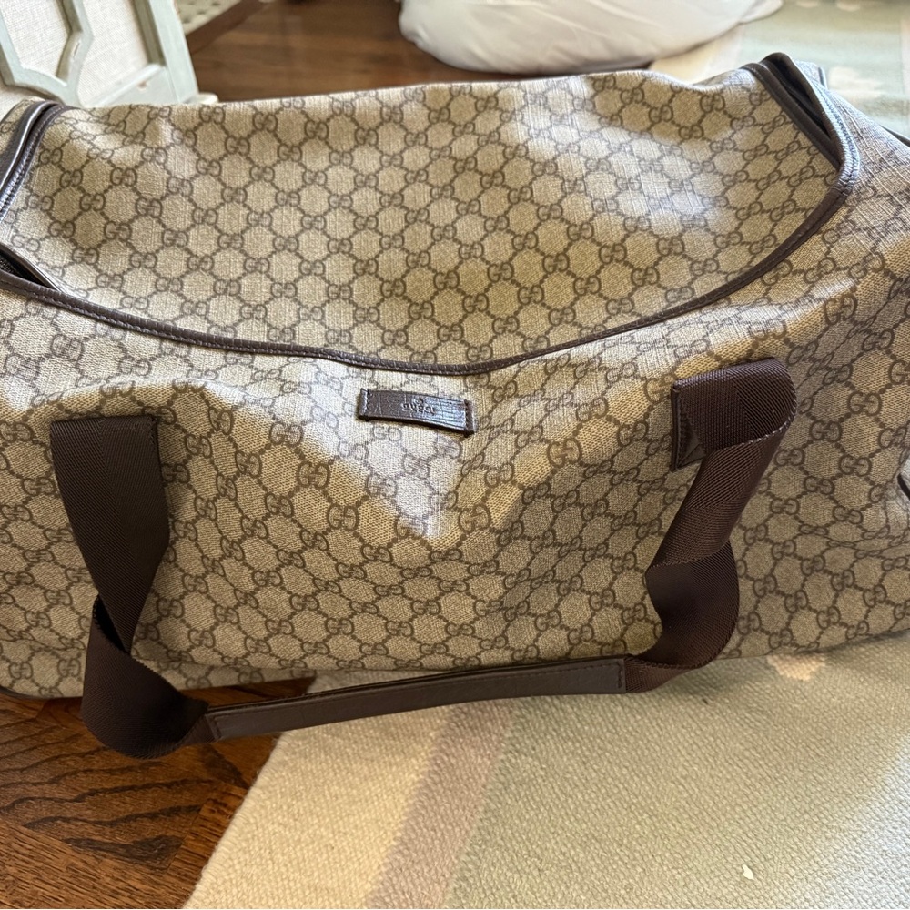 Authentic Gucci Rolling Duffle Bag